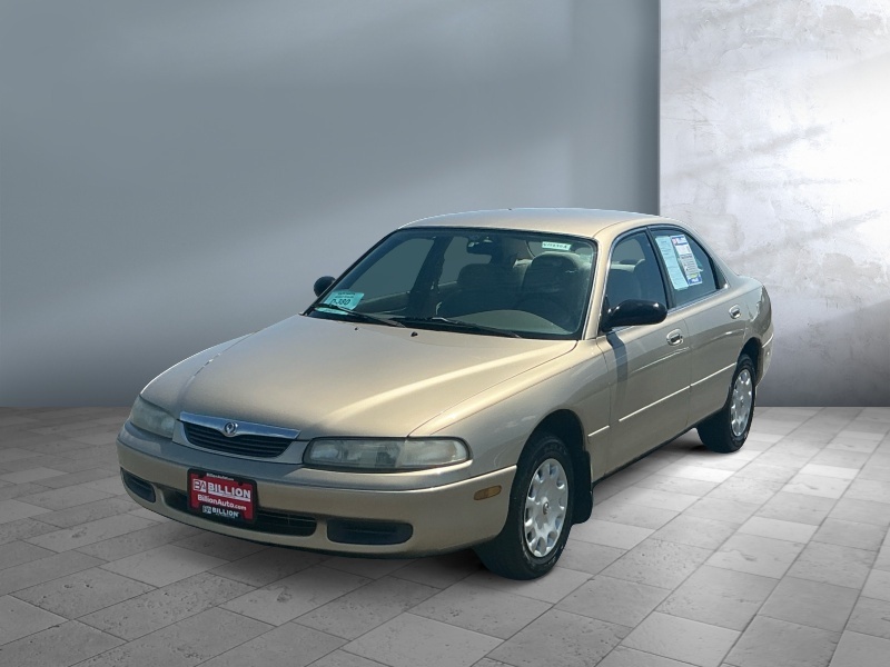 Brown (Tan) 1997 Mazda 626 DX Sedan Front-Wheel Drive Manual