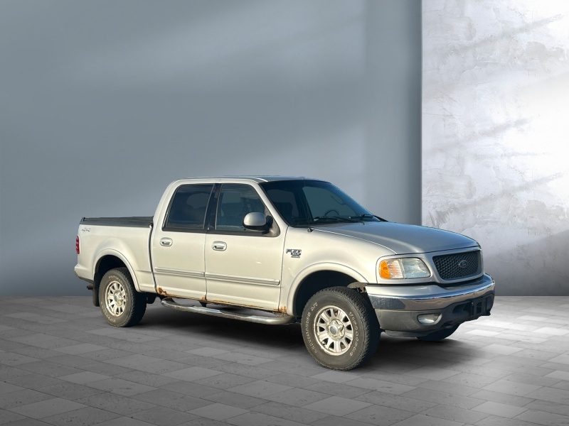 Silver 2003 Ford F-150 Pickup Truck Four-Wheel Drive